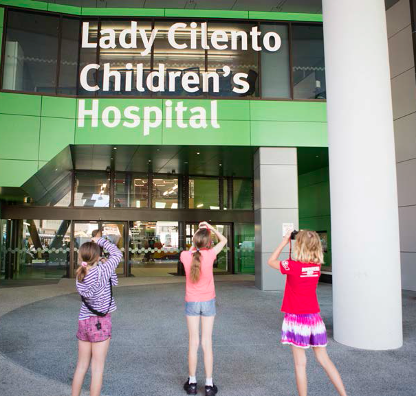 Three middle school students outside Lady Cilento Children's Hospital